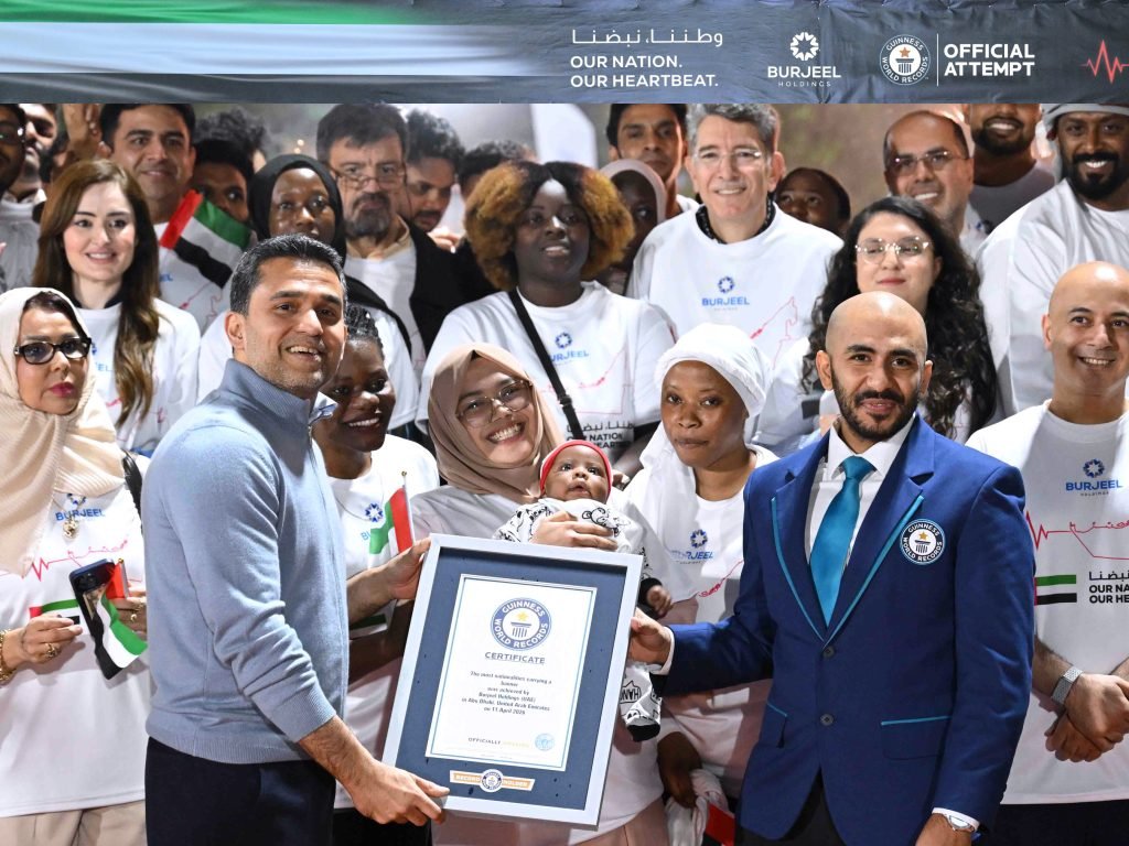 UAE sets Guinness World Record for most nationalities carrying flag banner